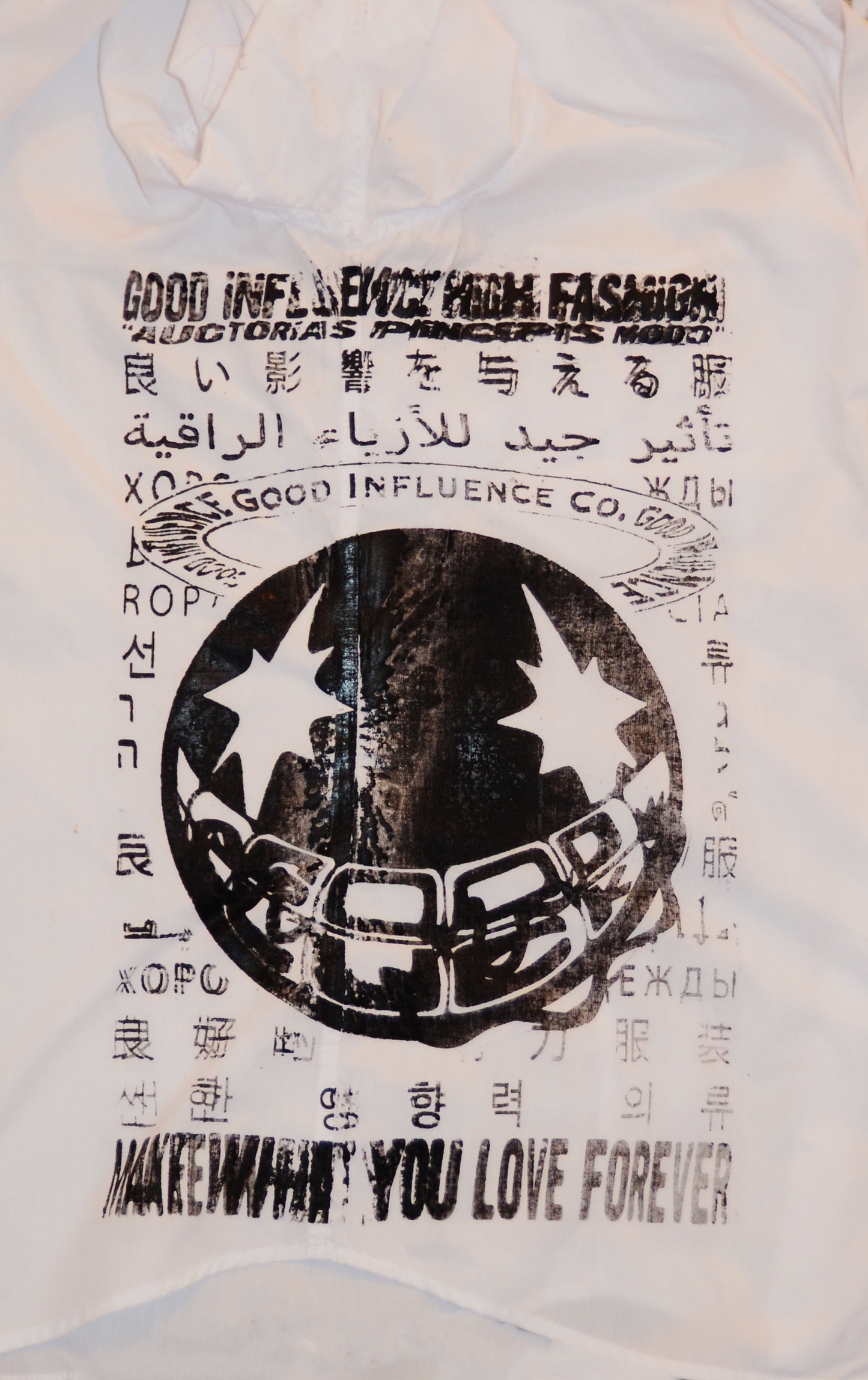 "MULTILINGUAL MESSAGE" Button up Tee